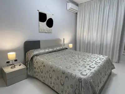 Letto o letti in una camera di Beatrice Casa Vacanze