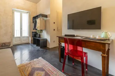 TV o dispositivi per l'intrattenimento presso P43 Sicilian Suites