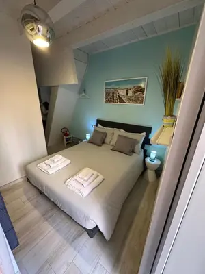 Letto o letti in una camera di Suite Moen Ortigia