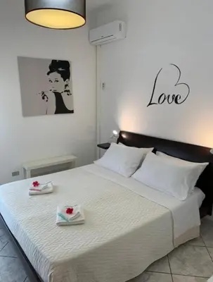 Letto o letti in una camera di THE AIRPORT HOUSE