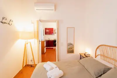 Letto o letti in una camera di Naiadi Apartment Ortigia