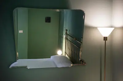 Letto o letti in una camera di Le Stanze del Cioccolato