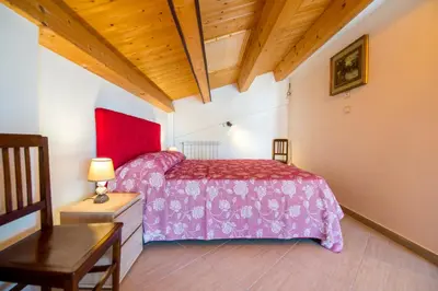 Letto o letti in una camera di Villa Donata Fontane Bianche