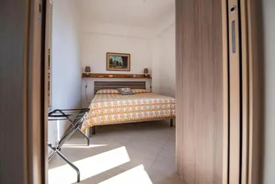 Letto o letti in una camera di Villa Donata Fontane Bianche