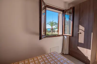 Letto o letti in una camera di Villa Donata Fontane Bianche