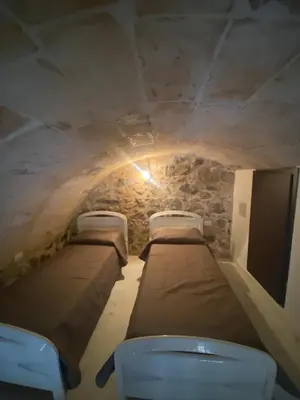 Letto o letti in una camera di Dory’s House