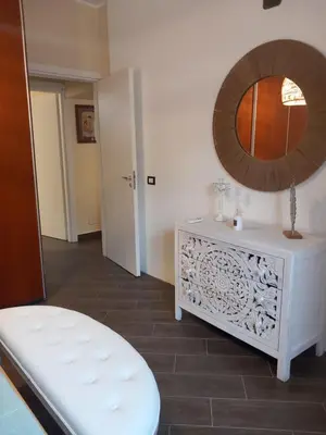Letto o letti in una camera di Casa Antica Grecia