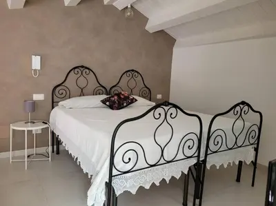 Letto o letti in una camera di A 2 passi dal centro