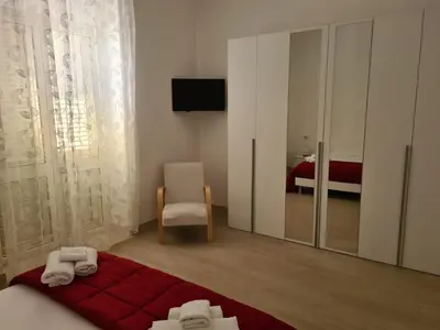 Letto o letti in una camera di Casa del papà