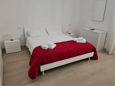 Letto o letti in una camera di Casa del papà