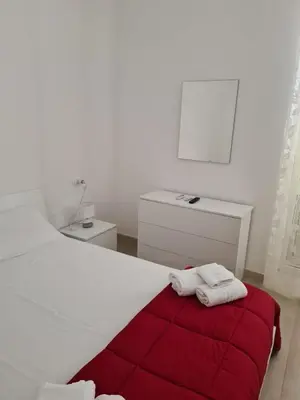 Letto o letti in una camera di Casa del papà