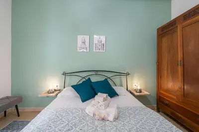 Letto o letti in una camera di Noto Barocca - HolidayHome