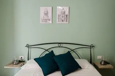 Letto o letti in una camera di Noto Barocca - HolidayHome