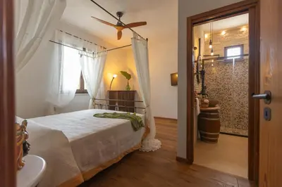 Letto o letti in una camera di VILLA I MORI 4, Emma Villas