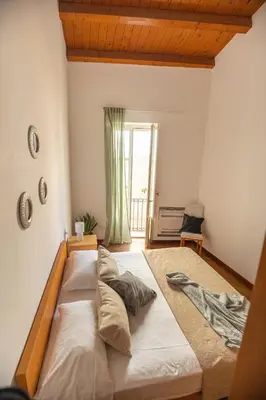 Letto o letti in una camera di Anacreonte Ortigia Apartment