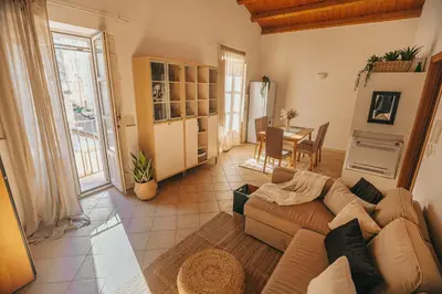 Area soggiorno di Anacreonte Ortigia Apartment