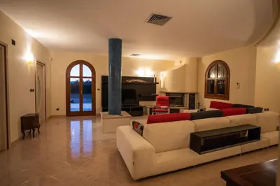 Area soggiorno di House Nicasia: villa con piscina
