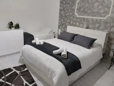 Letto o letti in una camera di House Lurokè