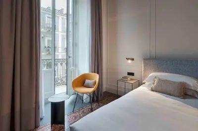 Letto o letti in una camera di Habitat Boutique Hotel
