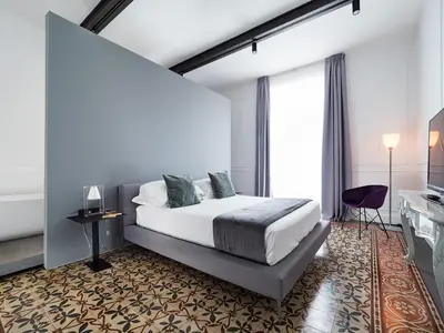 Letto o letti in una camera di Habitat Boutique Hotel