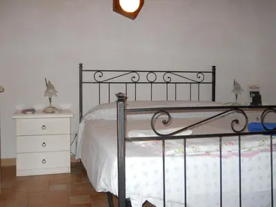 Letto o letti in una camera di Casa vacanze Fuori Tema