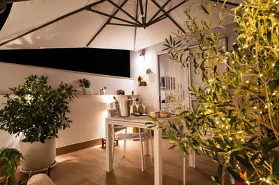 Area soggiorno di Casa Makrame by Ortigia Apartments