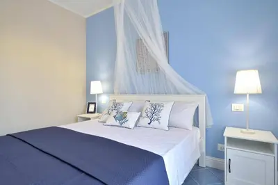Letto o letti in una camera di Villa Rosso Blu by Villa Plus