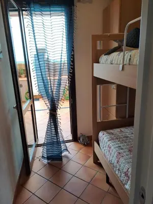 Letto o letti in una camera di Gioia di Mare
