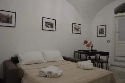 Letto o letti in una camera di MOUSUITE