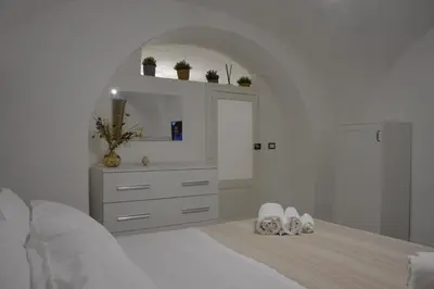 Letto o letti in una camera di MOUSUITE