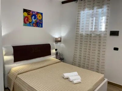 Letto o letti in una camera di Appartamenti Vittoria