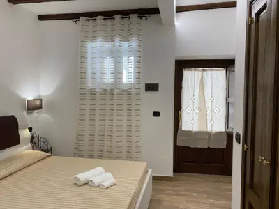 Letto o letti in una camera di Appartamenti Vittoria