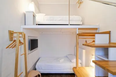 Letto o letti in una camera di La porta di mezzo