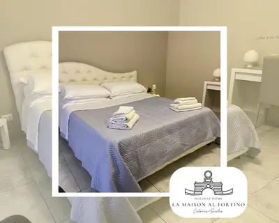 Letto o letti in una camera di La Maison al Fortino