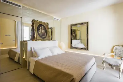 Letto o letti in una camera di Casa Novella con Terrazza by Wonderful Italy