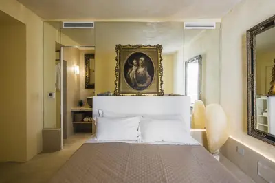Letto o letti in una camera di Casa Novella con Terrazza by Wonderful Italy