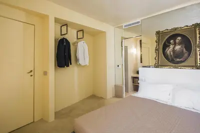 Letto o letti in una camera di Casa Novella con Terrazza by Wonderful Italy