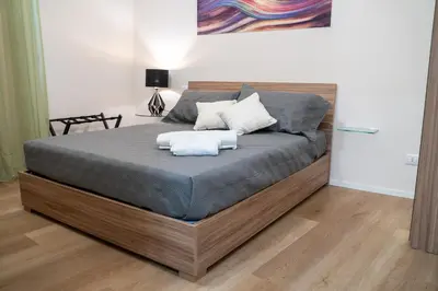 Letto o letti in una camera di B&b Meridia