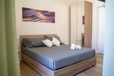 Letto o letti in una camera di B&b Meridia