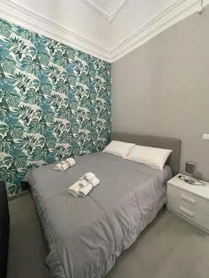 Letto o letti in una camera di Riccioli Home
