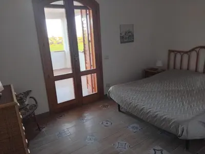 Letto o letti in una camera di Villa Carmela 2