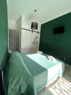 Letto o letti in una camera di Harmony Home