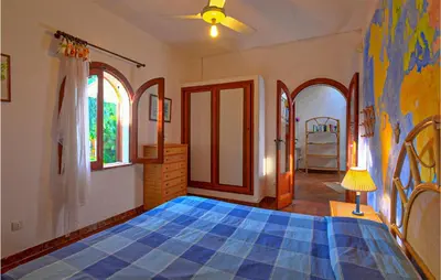 Letto o letti in una camera di Casa Fanusa