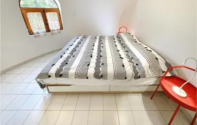Letto o letti in una camera di Gloria