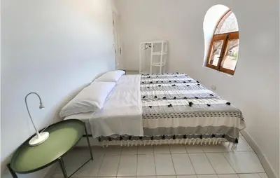 Letto o letti in una camera di Gloria