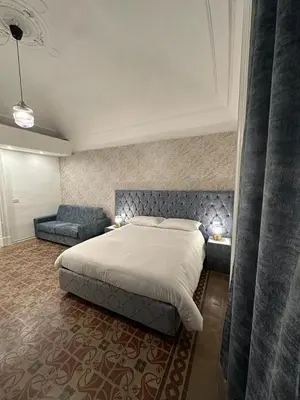 Letto o letti in una camera di Boutique Rooms B&B