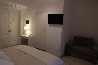 Letto o letti in una camera di Boutique Rooms B&B