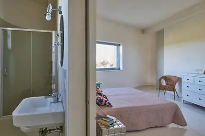 Letto o letti in una camera di Villa Vendicari