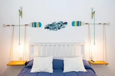 Letto o letti in una camera di Suite Eveneto by Ortigia Apartments