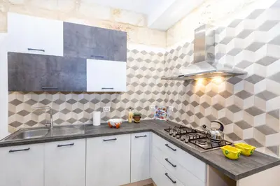 Cucina o angolo cottura di Suite Eveneto by Ortigia Apartments